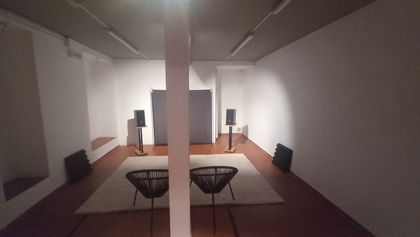 Two chairs and loudspeakers in the listening room